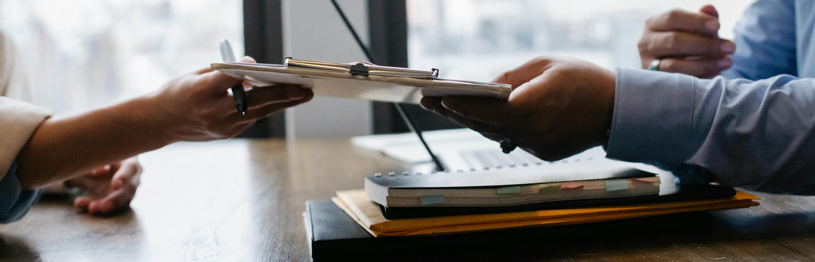 busines people interlinking hands