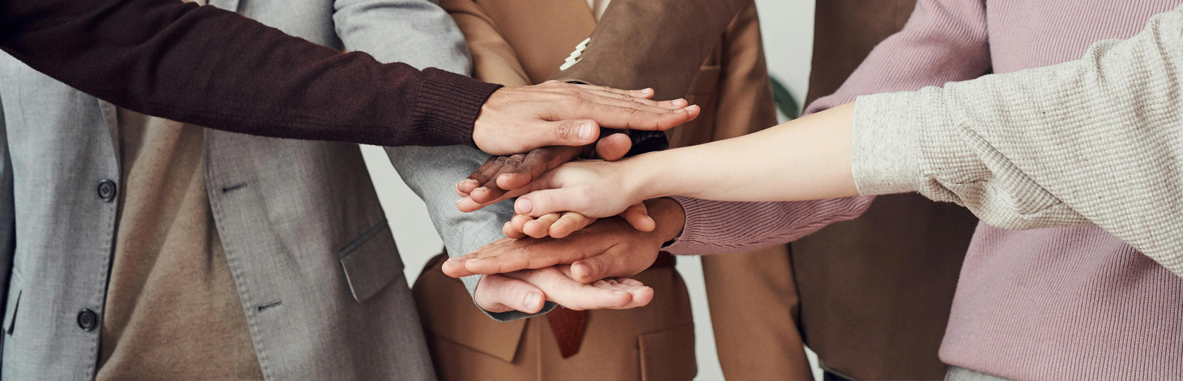 busines people interlinking hands